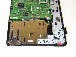 Lift out the USB Port and cable for the laptop base assembly. 