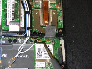 Remove the antenna wires from the mini wireless cards. 