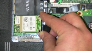 Remove the wireless mini PCI card. 