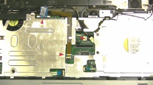 Pull the WIFI cables through the motherboard routing hole. 