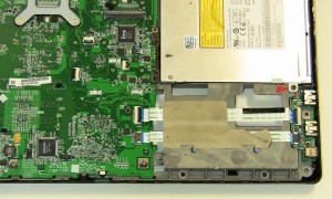 Lift the optical drive away from the motherboard. 