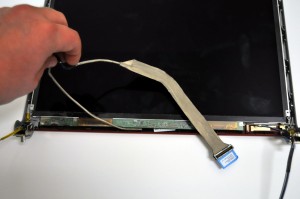 Lift the LCD screen away from the back assembly. 