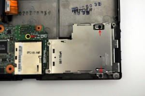 Lift the ExpressCard assembly away from the motherboard.