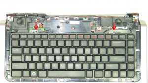 Unscrew the (2) 2mm x 3mm screws for the keyboard. 