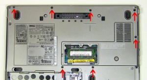 Unscrew the (7) 2.5mm x 8mm base screws. 