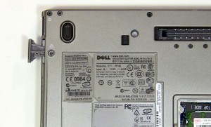 Pull the latch to slide the optical drive out of the laptop. 