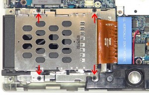 Take off the PCMCIA assembly from the motherboard.