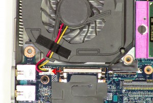 Lift the motherboard out of the laptop base.