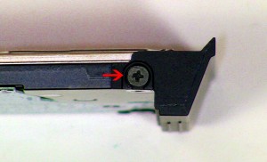 Unscrew and remove the hard drive caddy (1 x M3 x 3mm).