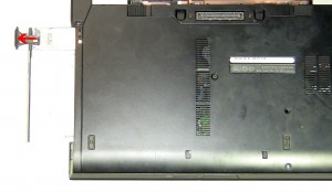 Pull the optical drive latch to slide the DVD Optical Drive out of the laptop.