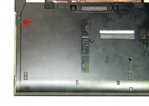 Press in the optical drive latch to get it to eject. 