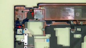 Remove the (2) 2.5mm x 5mm power button circuit board screws. 