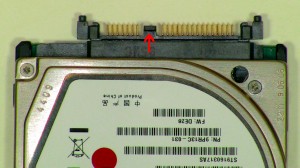Pull the hard drive adapter away from the SATA hard drive. 