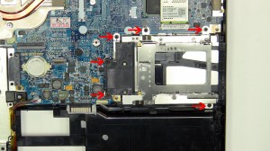 Lift the express card slot assembly away from the motherboard.