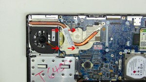 Carefully lift the heat sink away from the motherboard.