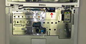 Loosen the LCD cable ground screw. 