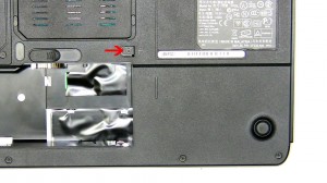 Using a screw driver slide the optical drive out of the laptop. 