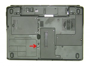 Remove the 2.5mm x 5mm optical drive retaining screw. 