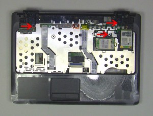 Remove the (3) 2.5mm x 5mm top palmrest screws. 