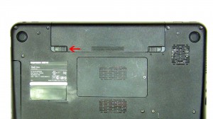 Slide the battery latch over and the battery out of the laptop. 