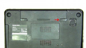 Slide the battery locking latch to the unlocked position. 