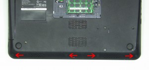 On the bottom of the laptop, remove the 4 screw covers. 
