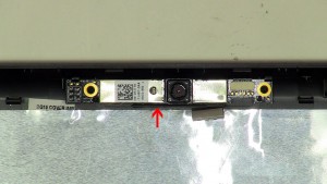 Unsnap the camera off of the LCD back assembly. 