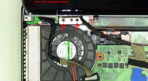 Unscrew the (2) 2.5mm X 5mm left hinge screws. 