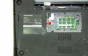 Remove the optical drive locking screw. 