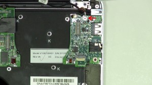 Remove the USB/audio port screw. Remove the USB audio port circuit board from the ultrabook.