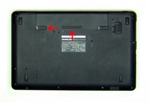 Slide the battery locking latch to the unlocked position. 