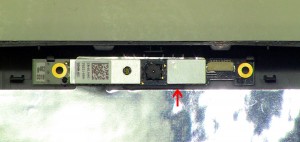 Remove the LCD camera from the back cover. 