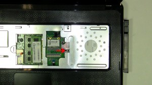 Remove the optical drive locking screw.