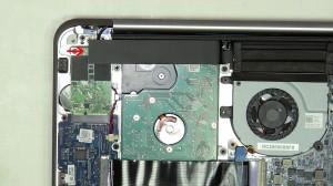 Remove the SSD SD ribbon cable. 