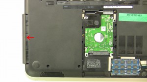 Using the tab, slide the hard drive out of the laptop.