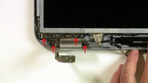 Remove the right hinge screws. 