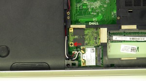 Remove the screw and remove the mSATA SSD hard drive. 