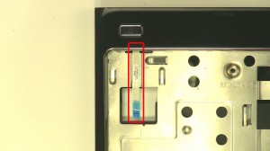 Remove the power button circuit board.