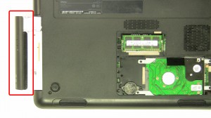 Slide the optical drive out of the laptop.