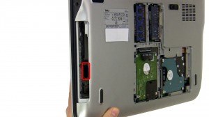 Remove the 3 screws under the optical drive.