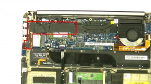 Remove the plastic cover over the mSATA SSD and WLAN cards.