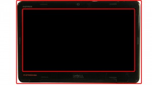 Pry up and unsnap the LCD bezel. 