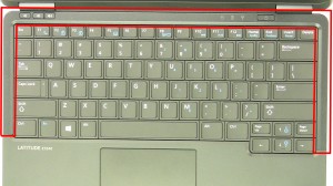 Unsnap the bezel around the keyboard.