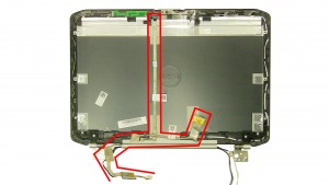 Remove the LCD cable and the camera cable.