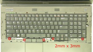 Remove the 5 - M2 x 3mm keyboard screws.