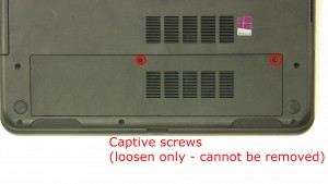 Loosen the access door cover screws (cannot be removed).