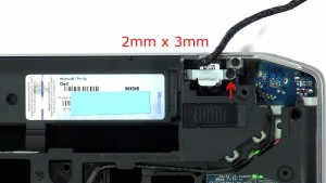 Remove the DC jack bracket screw and bracket (1 x M2 x 3mm).