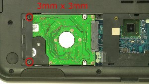 Remove the 2 - M3 x 3mm hard drive screws.