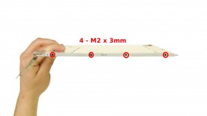 Remove the 8 - M2 x 3mm hinge rail screws.