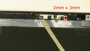 Remove the 1 - M2 x 3mm web camera screw.